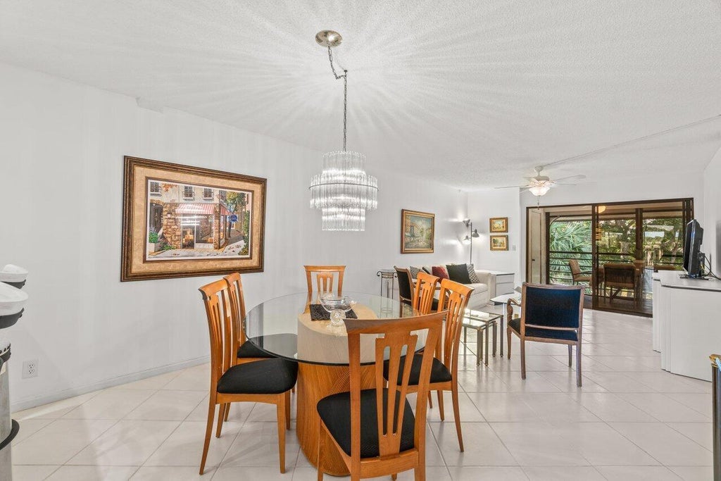 Photo of 5380 CEDAR LAKE Drive #303, Boynton Beach, FL 33437 (MLS # B26078560)