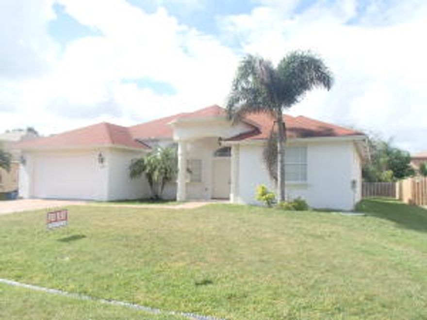 UPGRADED! Beautifully maintained and spacious home in desirable area with 2 car garage.  Stainless Steel Appliances, Granite Counter. Wooden Floors and Tile throughout. Master bathroom has dual sinks too. Formal Living & Dining room, Huge Family Room, and generous walk-in closets