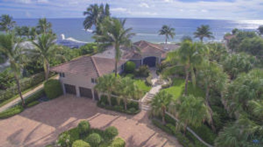 Panorama ocean views from the moment you enter. Shadows of 1950 still remain in this unique oceanfront home. Originally owned by Perry Como, he always called it his little slice of paradise.  The original safari room still remains. Beamed ceilings in the fourth bedroom suite with breakfast bar. Master suite offers sitting room, his and her baths, Original wall to wall Hollywood style closets.  Extremely spacious rooms, large entry foyer, formal living room & dining room. Many updates include kitchen, maste