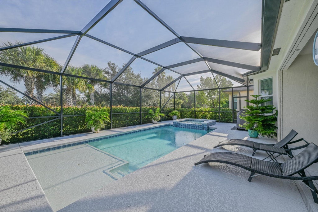 Photo of 11435 SW Lake Park Drive, Port Saint Lucie, FL 34987 (MLS # B26074084)
