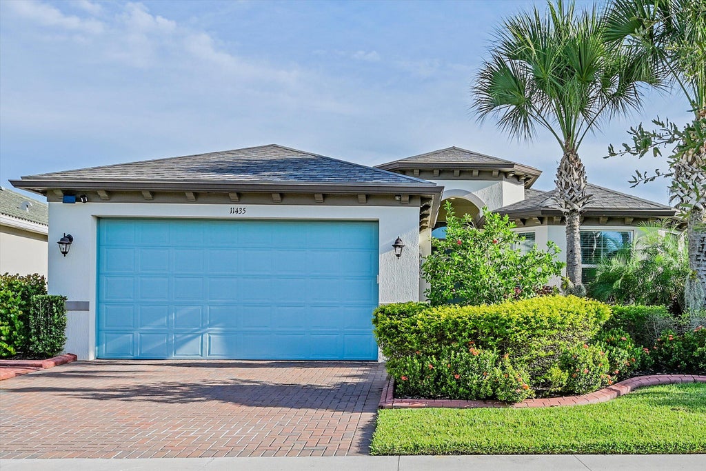 Photo of 11435 SW Lake Park Drive, Port Saint Lucie, FL 34987 (MLS # B26074084)