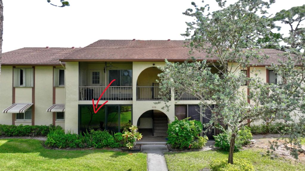 Photo of 335 Knotty Pine Circle #A-1, Greenacres, FL 33463 (MLS # R11085188)