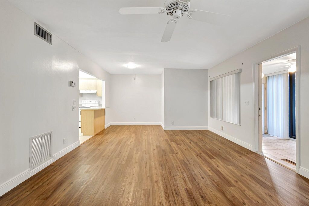 Photo of 335 Knotty Pine Circle #A-1, Greenacres, FL 33463 (MLS # R11085188)