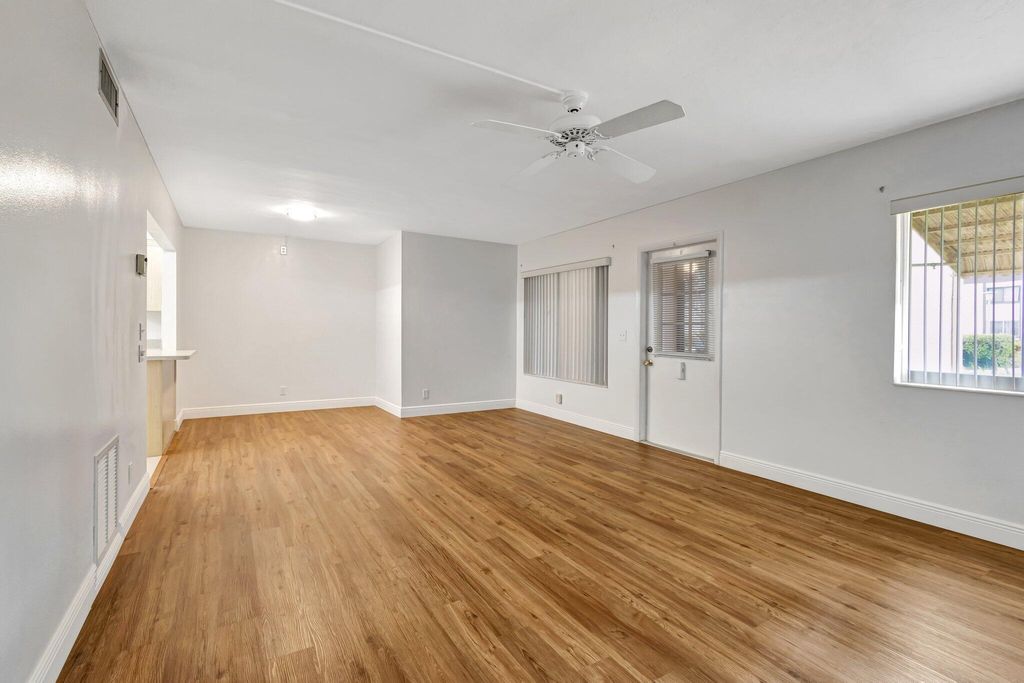 Photo of 335 Knotty Pine Circle #A-1, Greenacres, FL 33463 (MLS # R11085188)