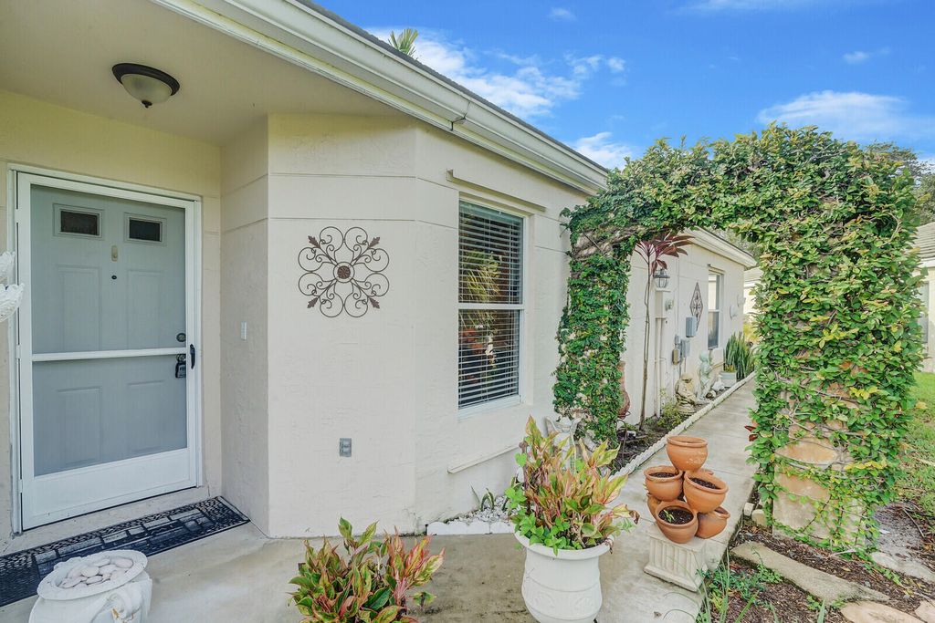 Photo of 1024 Island Manor Drive, Greenacres, FL 33413 (MLS # R11019479)