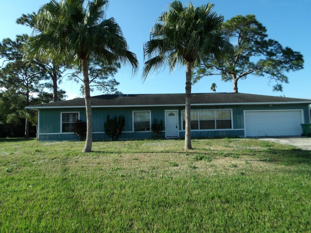 Photo of 682 NW Cardinal Drive, Port Saint Lucie, FL 34983 (MLS # R11149897)