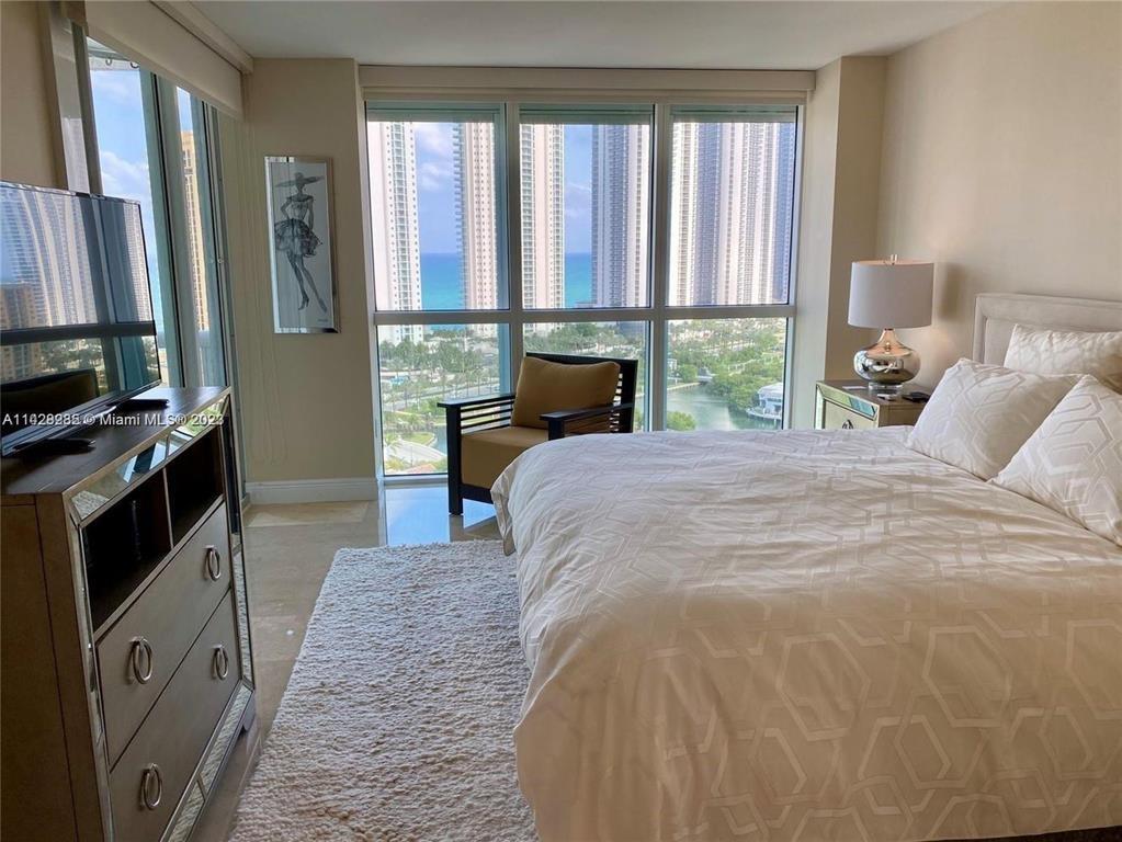 Experience luxury living at its finest in this stunning 20th-floor residence at Oceania V, located on a private island in the heart of Sunny Isles Beach. This fully furnished 2-bedroom, 2-bathroom condo with a den/office offers over 1,760 square feet of elegant living space, complemented by a spacious southeast-facing balcony that provides extraordinary ocean and Intracoastal views.