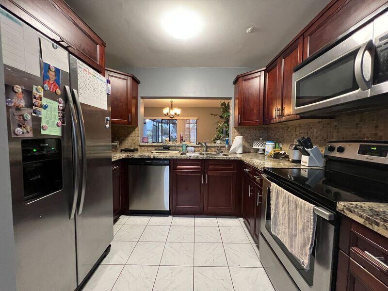 Photo of 12162 PASADENA Way, Boynton Beach, FL 33437 (MLS # B26056905)
