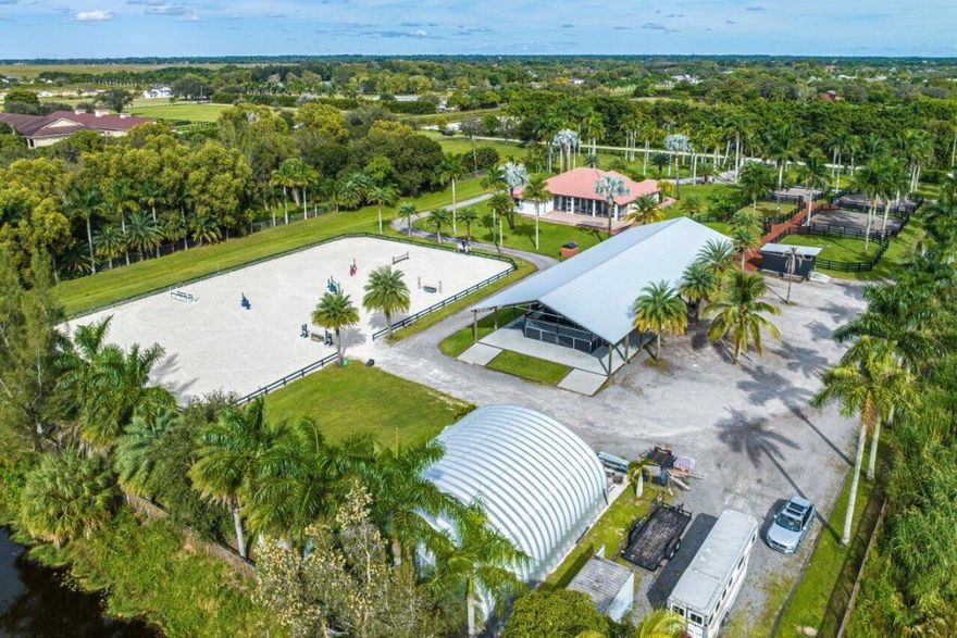 Barn with studio lounge, tack room, feed room, 4 covered wash stalls w/fans, RV hookups. Ring is 175 x 110 w/large irrigation jets, 6 irrigated paddocks. Hacking distance to 365 acre preserve at the end of the road as well as all Wellington bridle paths and WEF.