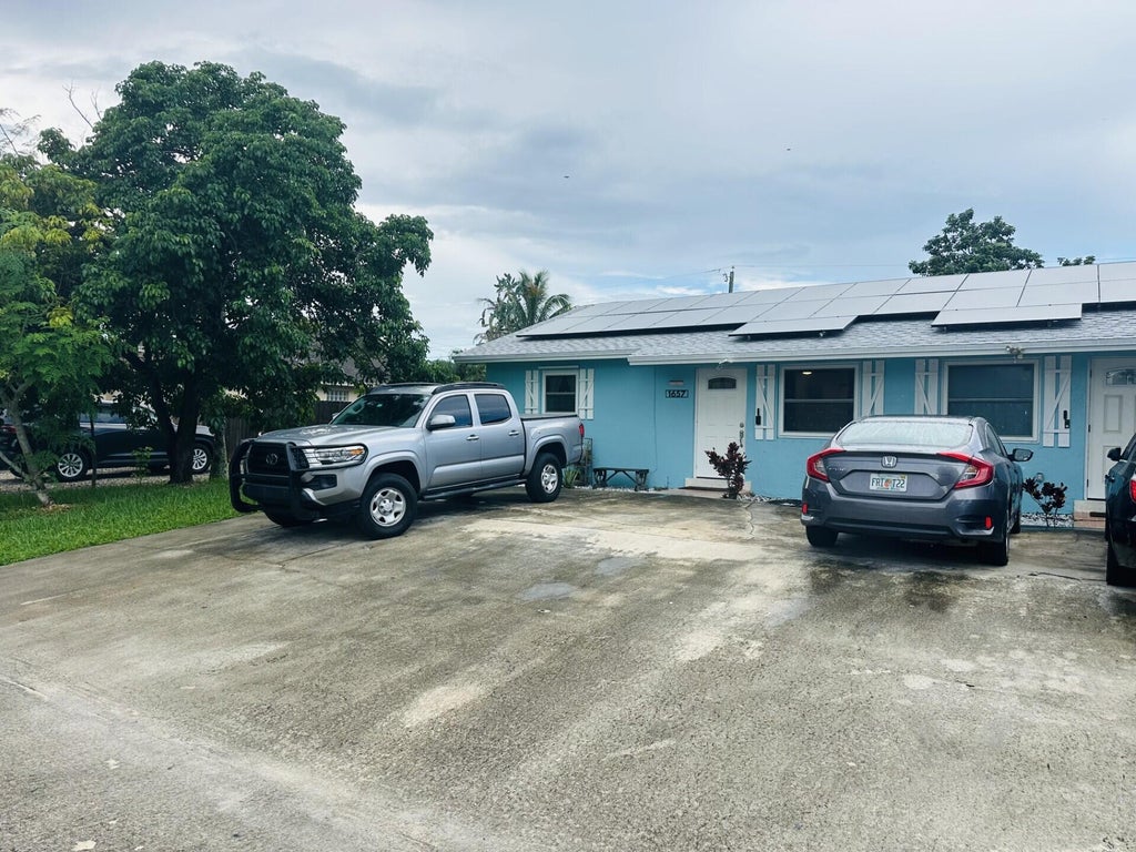 Photo of 1657 Magnolia Lane #2, West Palm Beach, FL 33417 (MLS # B26075353)