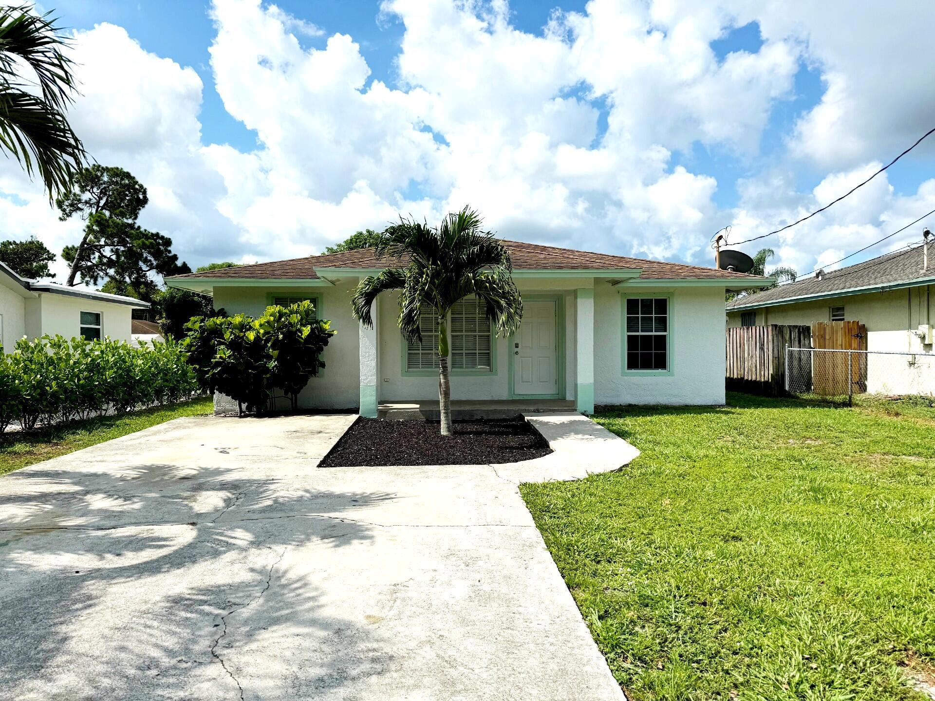 Spacious 4 bed, 2 bath single-family home in prime Jupiter location with no HOA! Freshly painted with all-tile living areas, new vinyl floors in bedrooms, and brand-new stainless steel appliances. Enjoy a huge fenced backyard perfect for entertaining, pets, and family fun. Located in an A-rated school district, walking distance to parks, shopping, and dining, with easy access to I-95, the Turnpike, and just minutes to Jupiter's stunning beaches. Water and lawn care included--move-in ready!