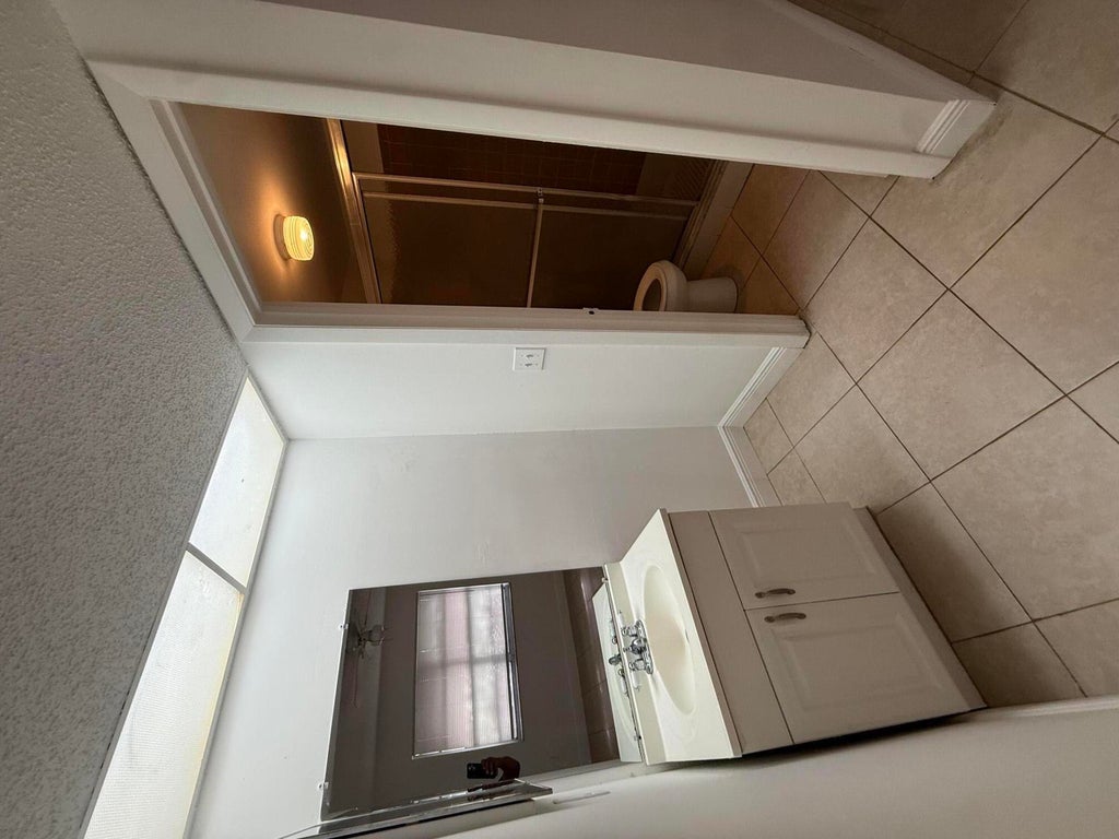 Photo of 3280 NW 103RD Terrace #204-A, Coral Springs, FL 33065 (MLS # B26074713)