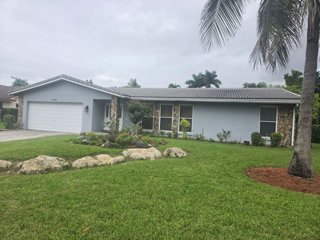 Photo of 11175 NW 20th Drive, Coral Springs, FL 33071 (MLS # B26075165)