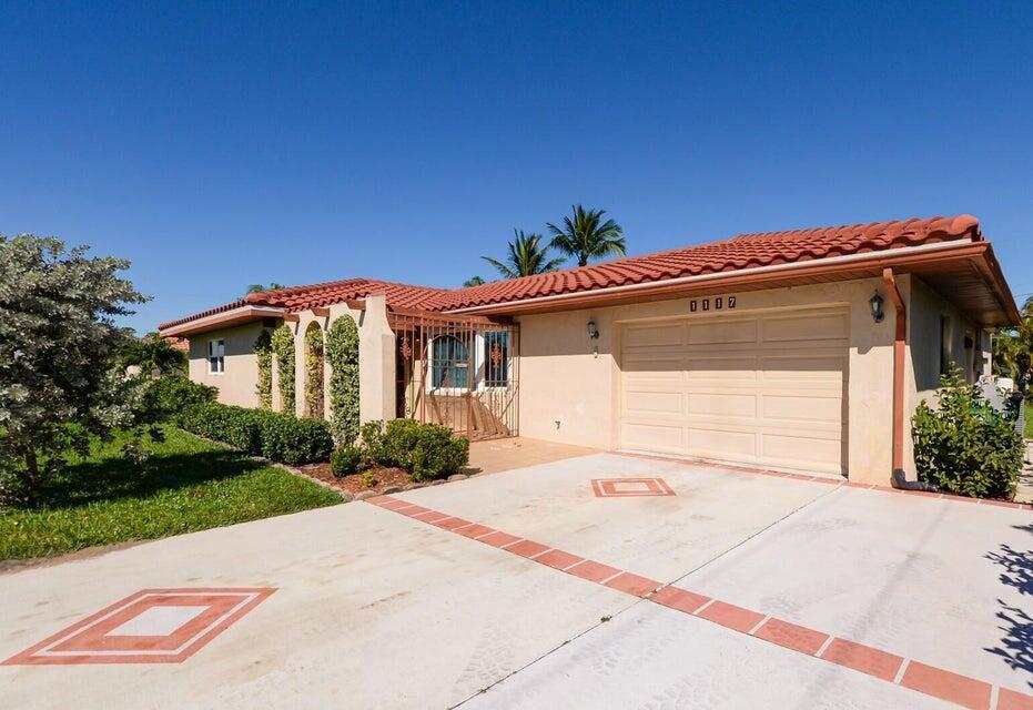 Wonderful CBS home with spacious living room and family room. Open kitchen with granite countertops, breakfast bar and dining area. Beautiful stone fireplace in family room. Living room with bay window, overlooks front gated porch. Primary suite with walk in closet, tile shower, side slider to private patio. Bedroom windows, bay window in living room and primary bedroom slider impact glass. Enclosed bonus room under air could be used as third bedroom or office space. Extended decorative driveway. Barrel tile roof 2016, AC 2019, water heater 2018. Located minutes to shopping and restaurants.