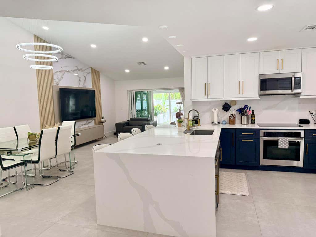 Photo of 4929 W Lakes Drive, Deerfield Beach, FL 33442 (MLS # B26059162)