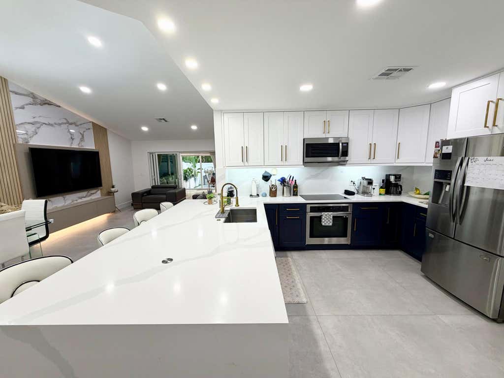 Photo of 4929 W Lakes Drive, Deerfield Beach, FL 33442 (MLS # B26059162)