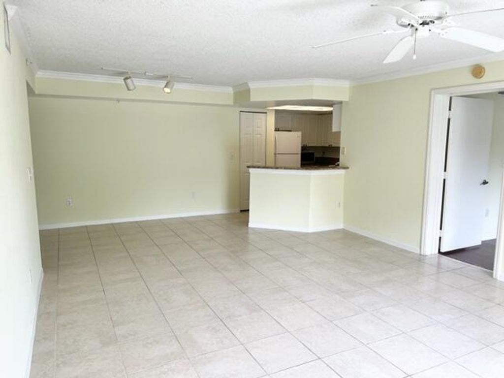 Photo of 800 S Crestwood Ct Court S #811, Royal Palm Beach, FL 33411 (MLS # B26011614)