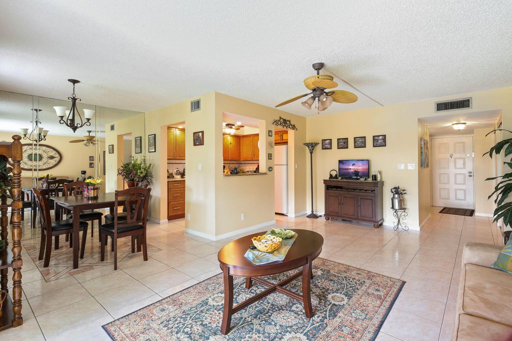 Photo of 3186 Via Poinciana Dr #110, Greenacres, FL 33467 (MLS # B26017540)