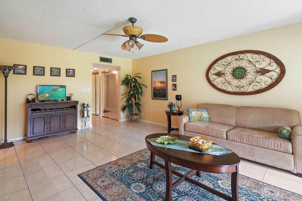Photo of 3186 Via Poinciana Dr #110, Greenacres, FL 33467 (MLS # B26017540)