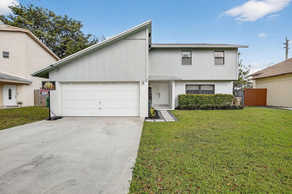 Photo of 7741 NW 42nd Court, Davie, FL 33024 (MLS # F10552405)