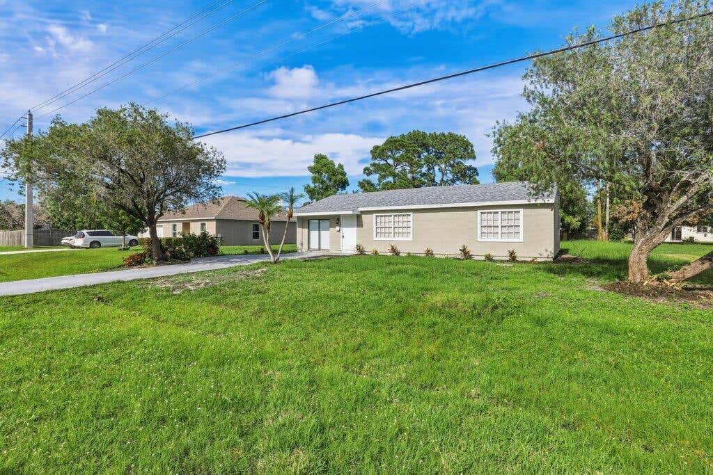 Photo of 2521 SE Berkshire Boulevard, Port Saint Lucie, FL 34952 (MLS # B26049557)
