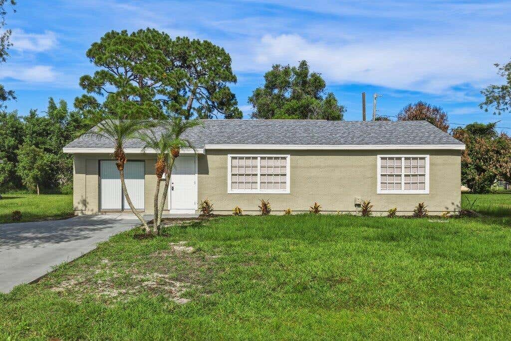Photo of 2521 SE Berkshire Boulevard, Port Saint Lucie, FL 34952 (MLS # B26049557)