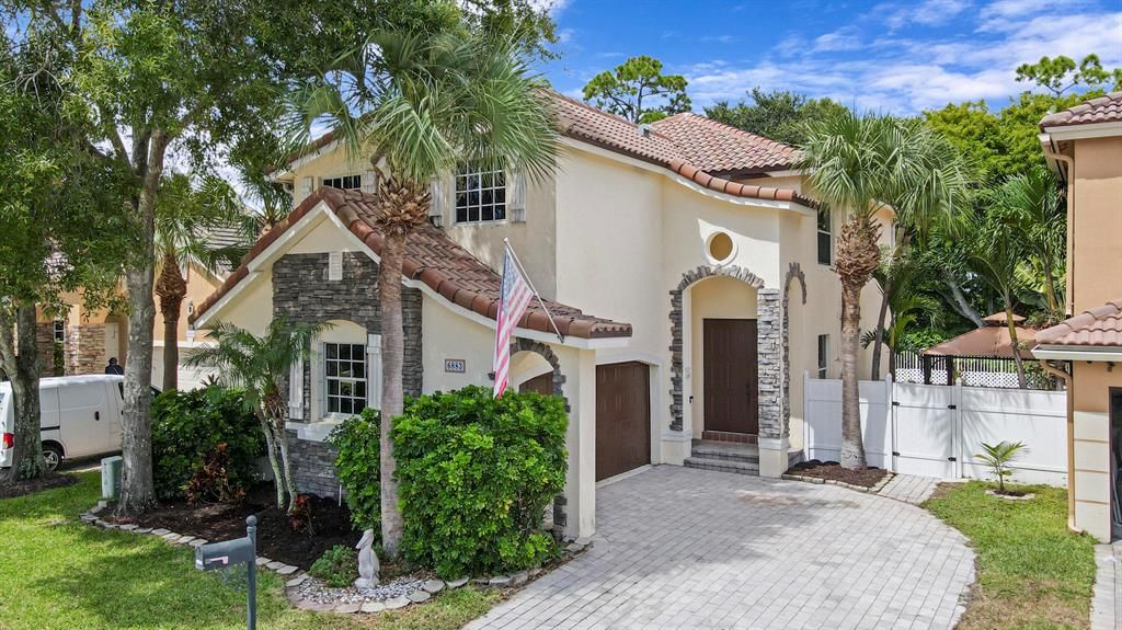 Photo of 6883 Spider Lily Lane Ln, Lake Worth Beach, FL 33462 (MLS # R10829068)