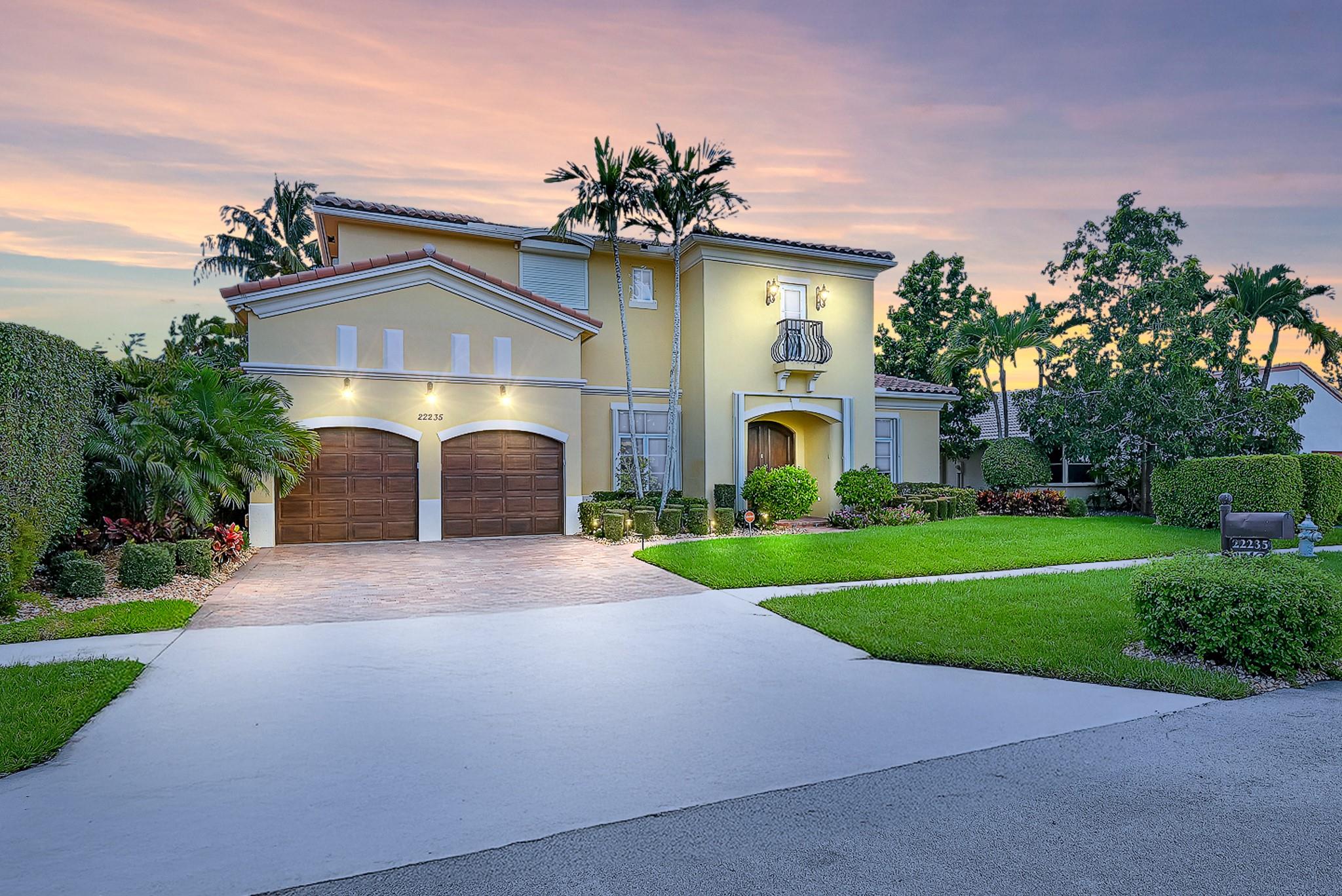 This timeless Mediterranean estate, built in 2003, is located in the prestigious and serene Thornhill Green and blends classic architectural detail with thoughtful, livable luxury. Offering 6 bedrooms, 6 bathrooms, and an oversized 2-car garage, the home features a smooth stucco exterior, a 2022 Spanish tile roof, and a grand arched entryway that sets the tone for what awaits inside.
As you enter, architectural detailing abounds—arched doorways, tray and coffered ceilings, and refined millwork create a luxurious yet inviting ambiance. The main level flooring is finished in stunning Jerusalem stone.
The heart of the home is the expansive chef’s kitchen, which opens to soaring ceilings and airy double-height windows that fill the space with natural light and lush garden views.