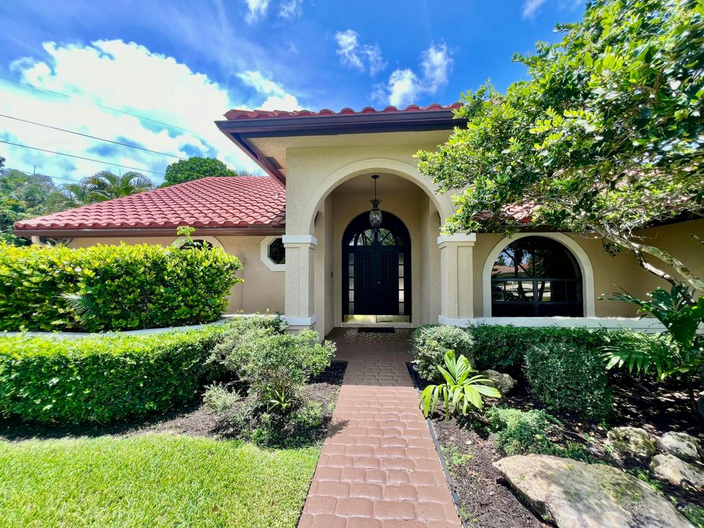 Photo of 104 Greenbrier Court, Atlantis, FL 33462 (MLS # R11048969)