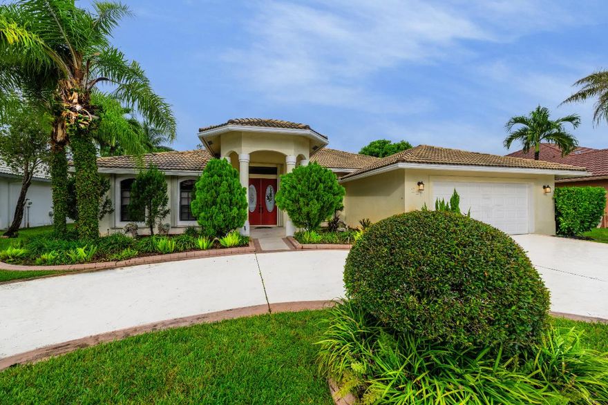 WOW WOW WOW !! This spacious four-bedroom, three-bathroom home is a perfect blend of comfort and luxury. The open-concept layout is enhanced by bright tiled floors that create a light and airy feel throughout the house Step outside to the screened-in pool area, where you can relax and enjoy the serene water view from your backyard with exotic fruit trees. The home also features a newer HVAC unit, a modern updated kitchen with state-of-the-art appliances, and a convenient circular driveway for easy access. All of this is located within a secure, gated community, offering both privacy and peace of mind. Not to mention, minutes from shopping centers, Mall, and restaurants.