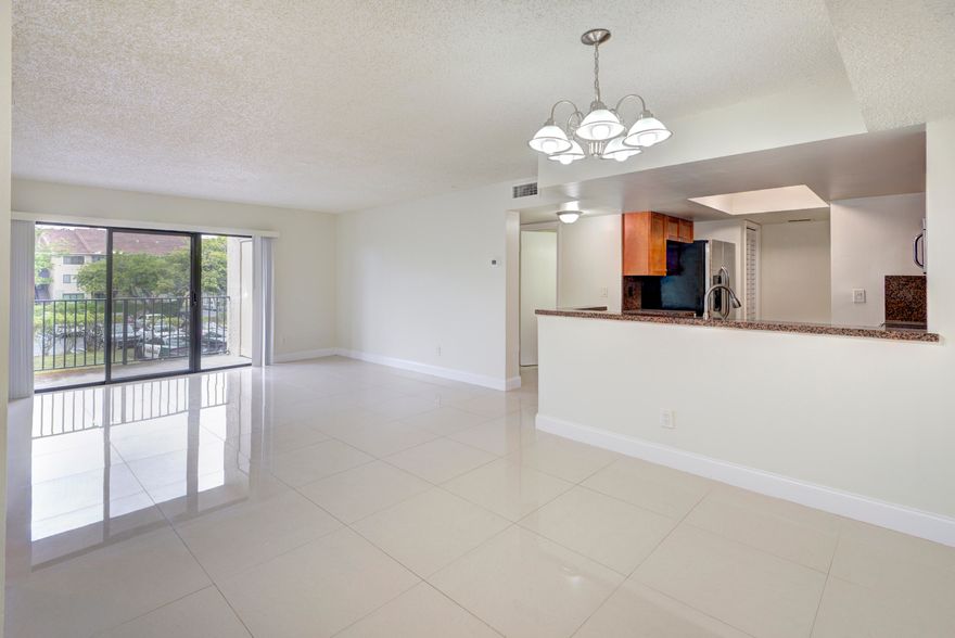 lean and bright 2 bedroom, 2 bathroom unit on the second floor. This spacious condo is located in the gated community of Visconti. Updated kitchen with stainless steel appliances and granite counters, large tile flooring in the common areas and laminate in the bedrooms, updated bathrooms with newer vanities, toilets and fixtures. Washer and dryer located in the unit. Open patio with storage closet. Amazing location and close to everything: minutes to I-75, I-595, across the street from Coral Square Mall, near entertainment, shopping, & restaurants. Visconti Condominiums is a high end gated community with many amenities: 2 swimming pools, a fitness center, clubhouse, tennis courts, play area, car wash area, dog park, and peaceful walking paths.