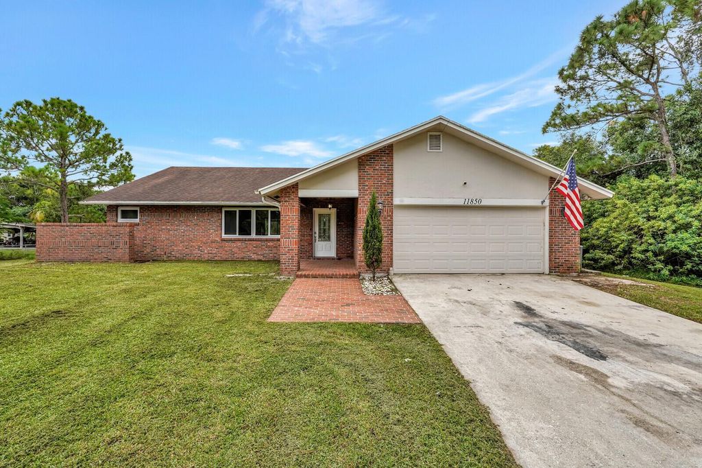 Photo of 11850 62nd Lane N, The Acreage, FL 33412 (MLS # R10927171)