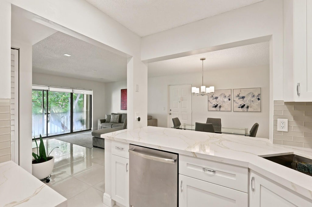 Photo of 609 SEA PINE Way #F2, Greenacres, FL 33415 (MLS # B26063977)