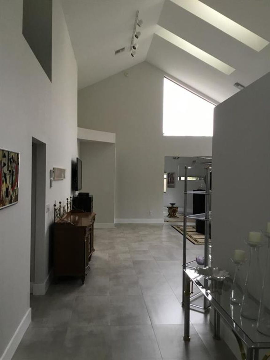 Lovely 3 bedroom, 3 bath single family home.  New Porcelain floors with private patio in back yard.  Updated kitchen, white cabinets and granite also stainless steel appliances.  Golf, tennis and social included.  Like living in a 5 star hotel