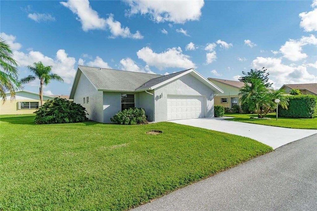 Photo of 3830 ROWENA Circle, West Palm Beach, FL 33417 (MLS # B26093526)