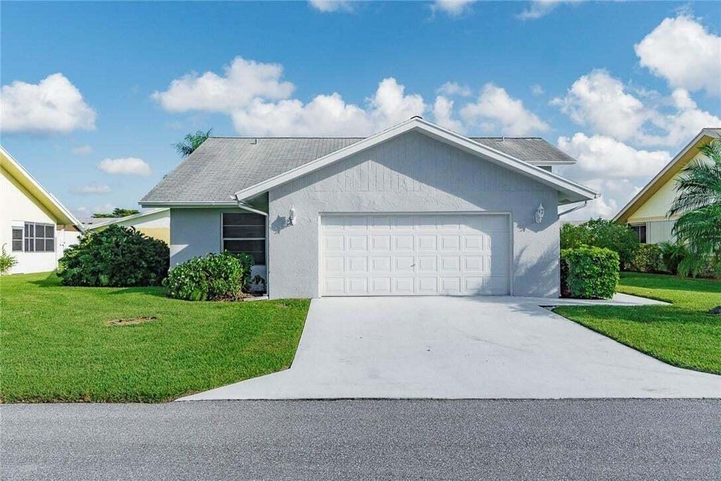 Photo of 3830 ROWENA Circle, West Palm Beach, FL 33417 (MLS # B26093526)
