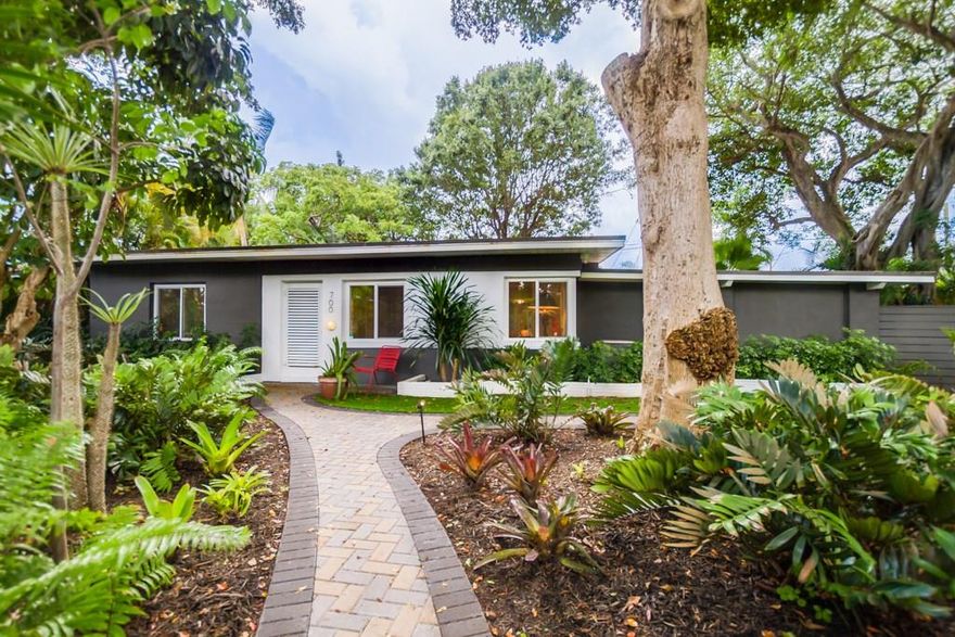 Sophisticated early Mid-Century Masterpiece! Stylishly renovated open concept 3/2 home in Wilton Manors. Impact windows, hardwood floors, remodeled bathrooms, new electric panel, landscaping & more. Open kitchen w/granite counters, new appliances & breakfast bar. Beautiful living, dining & family room, huge master w/sitting area, walk in closet & ensuite bath.  Prime corner lot w/room for a pool. Blocks from Wilton Dr, mins to beaches, downtown & I-95. This home is truly unique and ready to move in.