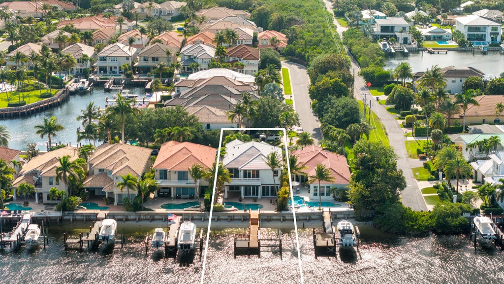 Photo of 712 Sandy Point Lane, North Palm Beach, FL 33410 (MLS # B26062677)
