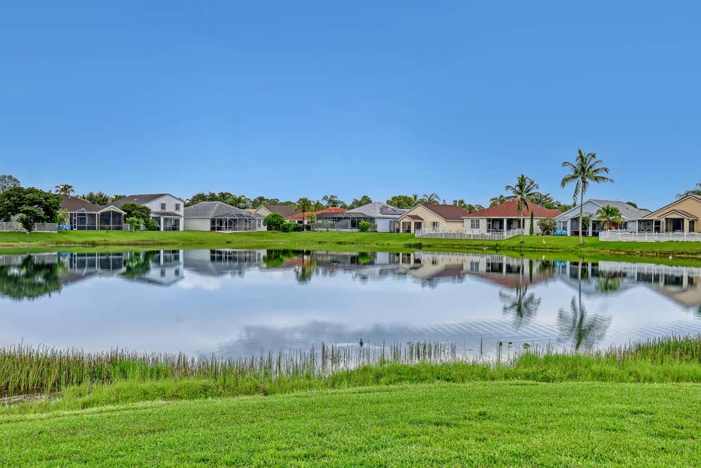 Photo of 101 Meadowlands Drive, Royal Palm Beach, FL 33411 (MLS # B26045130)