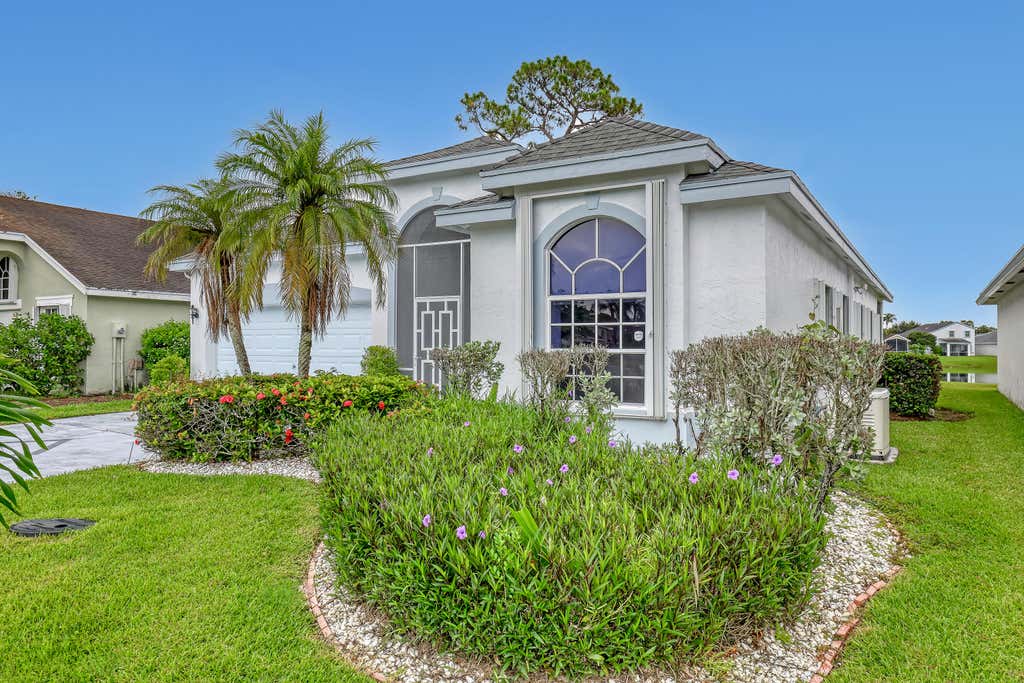 Photo of 101 Meadowlands Drive, Royal Palm Beach, FL 33411 (MLS # B26045130)