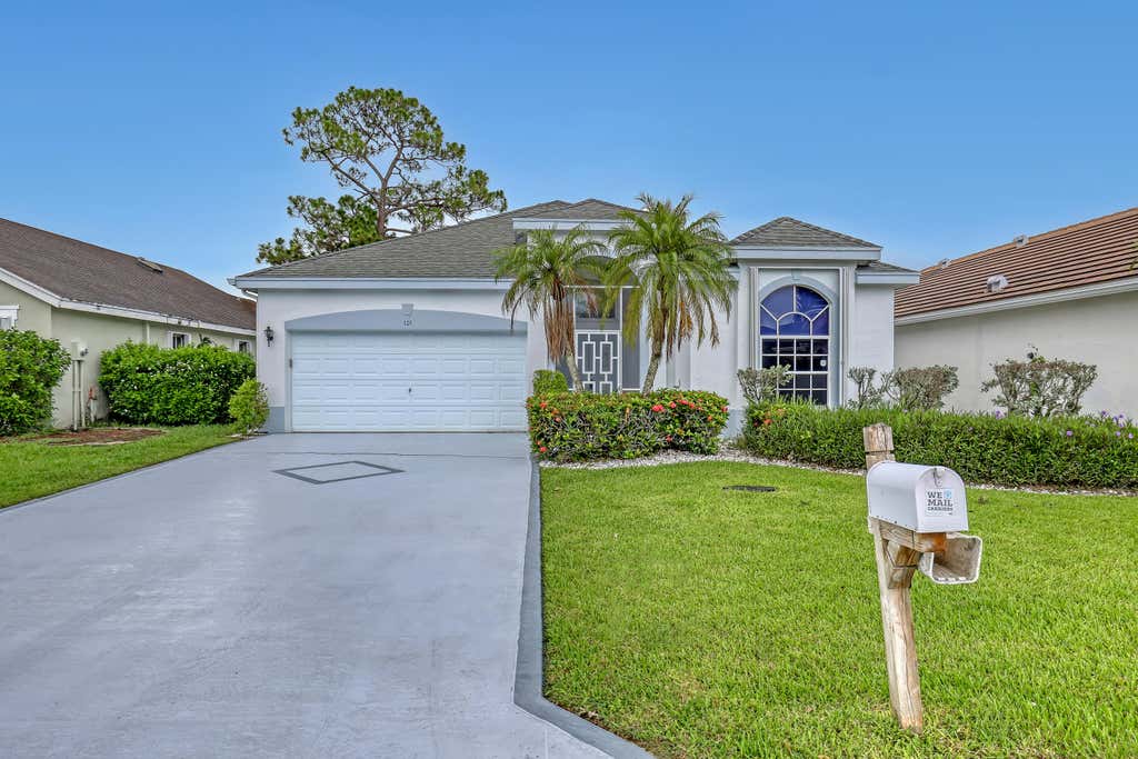 Photo of 101 Meadowlands Drive, Royal Palm Beach, FL 33411 (MLS # B26045130)
