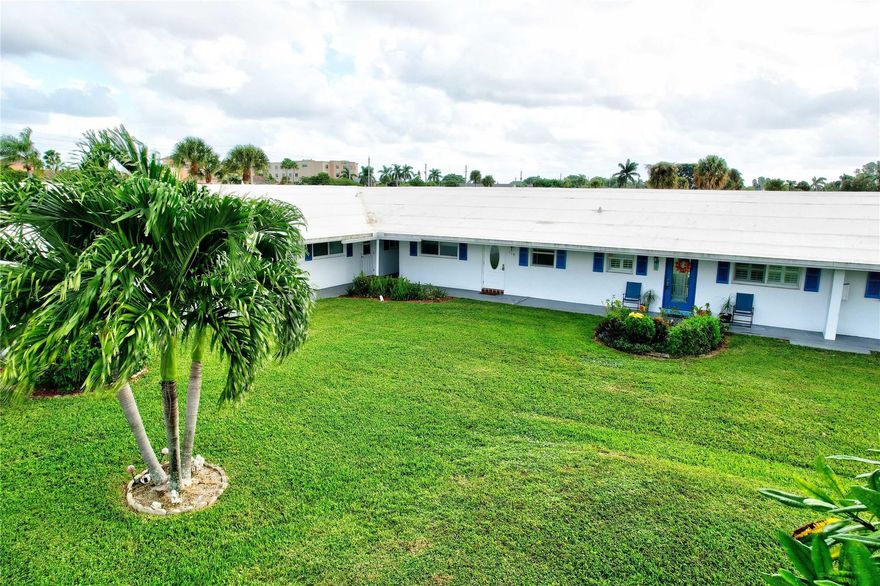 Step into the charm of this inviting 2-bedroom, 2-bath, first-floor corner villa overlooking the lush greens of the Palm Beach Leisureville golf course. Ready for your personal touch, this home offers endless potential to make it your own—just as the virtually staged images suggest. Enjoy panoramic views of the Par-3 course and lake from your patio on the 18th hole. Features include wood cabinetry, new appliances, hurricane-impact windows and doors, custom window treatments, and retractable patio awning. Indulge in the amenities this 55+ community offers—three clubhouses each with its own pool, a fitness center, and a variety of activities for every interest. Located minutes from I-95 and major shopping, this home offers the perfect blend of recreation and convenience. Small pet friendly!