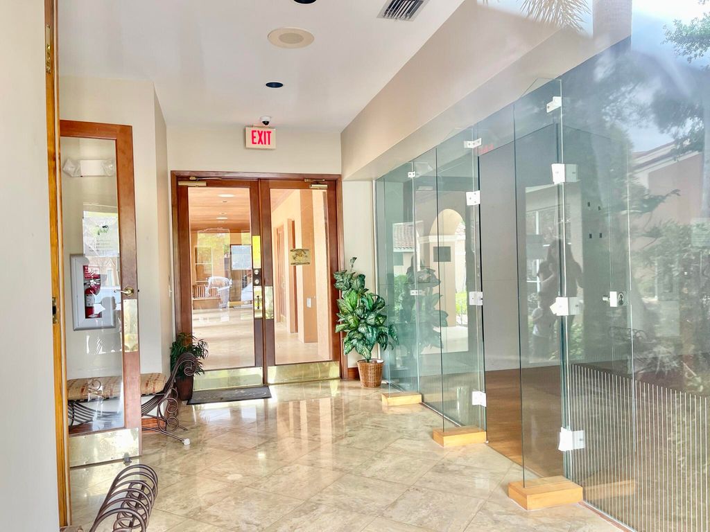 Photo of 4856 N State Rd 7 #1207, Coconut Creek, FL 33073 (MLS # B26029035)