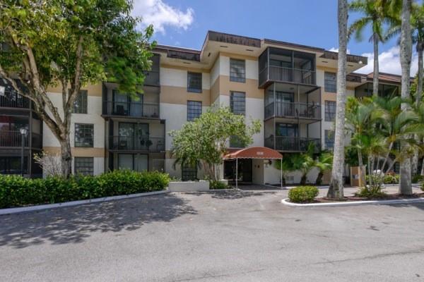 Huge condo unit in a gated community, corner unit ready for move-in. It's a very spacious unit as it is located in a corner. It has all impact windows, formal living room, formal dining room, breakfast area. It's one of the biggest unit in the building. Kitchen has granite counters, master room has a huge walk-in closet. This unit is a must see, aplace to relax and enjoy living. Water is included and there is washer/dryer in the unit. It's conveniently located with easy access to the Florida Turnpike, State Rd 7, Lyons Rd and near popular shops, 7 miles from Broward Mall, 4 miles from Lauderhill Mall. You don't want to miss this one. Book your appointment today! Association requires a 700 credit score and a minimum income of $55,000 per year. Easy to show. Book online!