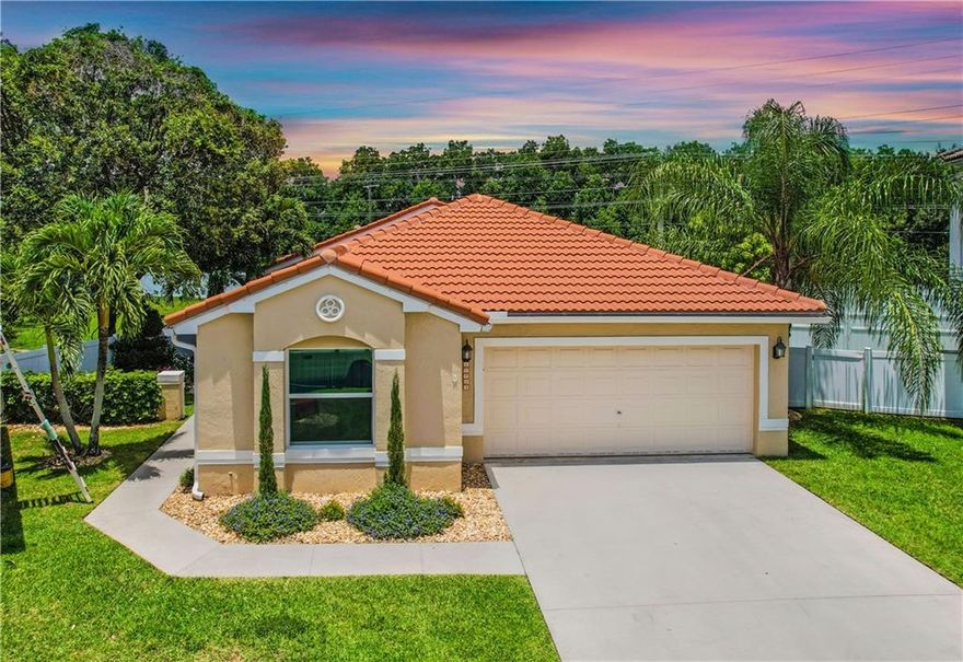 ABSOLUTELY STUNNING 3 Bed / 2 bath home in the highly sought after neighborhood of Kensington Green in Coral Springs! NEW ROOF (2017) & IMPACT WINDOWS! Decked out renovations from top to bottom! HUGE GORMET KITCHEN with dark wood cabinetry, soft closing drawers, level 3 GRANITE COUNTER TOPS, black granite sink, glass tile backsplash and STAINLESS STEEL APPLIANCES. Newer A/C unit installed 2016. FENCED YARD. Community pool just a few houses away. Plenty of room for your custom pool to be installed in this back yard! BEST SCHOOL DISTRICT IN CORAL SPRINGS!