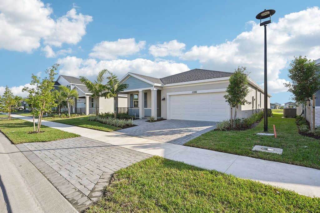 Photo of 11286 NW Blockbird Drive, Port Saint Lucie, FL 34987 (MLS # R11130001)