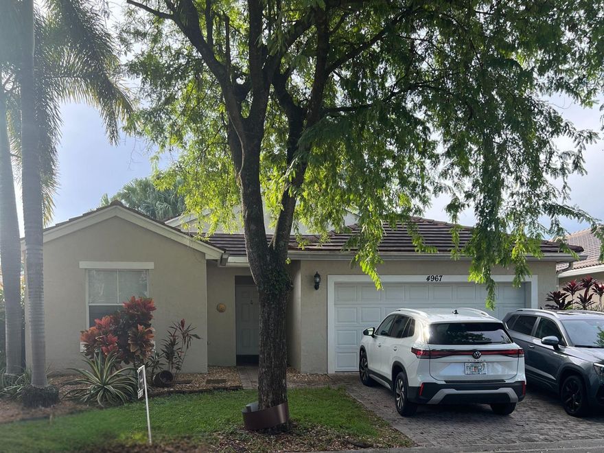 Enjoy Florida living in this 3-bedroom, 2-bath home nestled on a peaceful street in a beautiful guard-gated community. The open concept design and vaulted ceilings create a bright, airy feel, while the large kitchen is perfect for gatherings. Prime location close to shopping, beaches, restaurants, the airport and so much more.