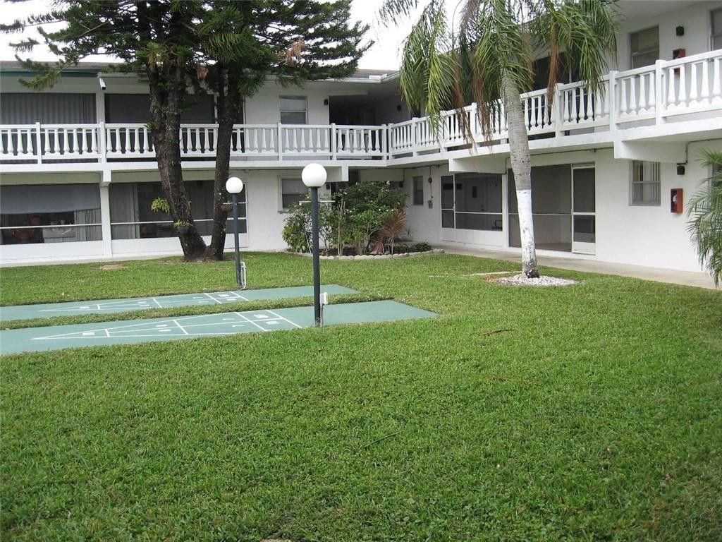 Photo of 1631 NW 46th Avenue #118, Lauderhill, FL 33313 (MLS # B26023721)