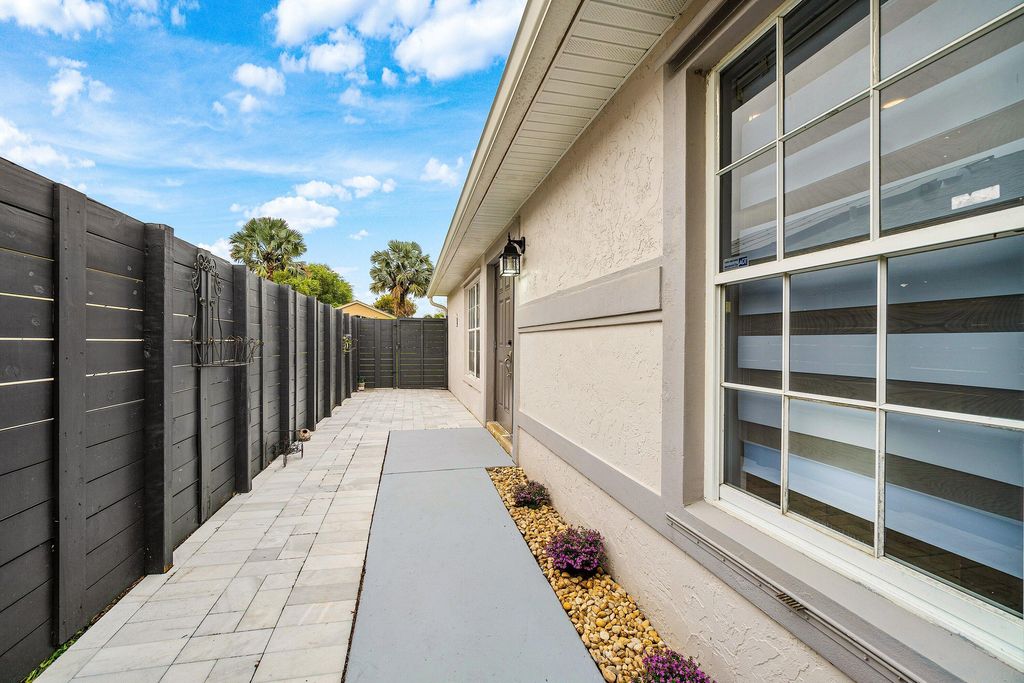 Photo of 5713 Boynton Bay Circle, Boynton Beach, FL 33437 (MLS # B26004900)