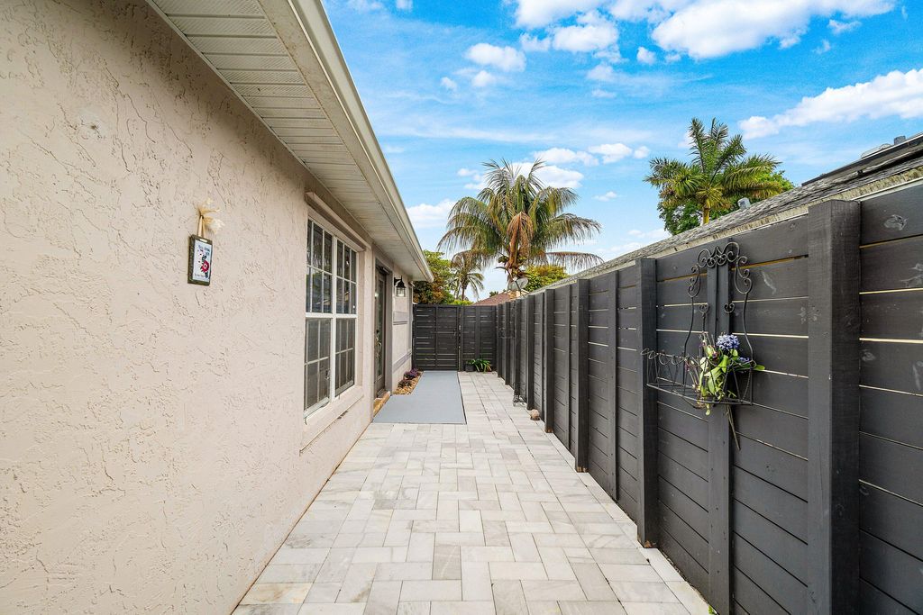 Photo of 5713 Boynton Bay Circle, Boynton Beach, FL 33437 (MLS # B26004900)